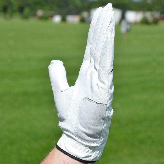 person wearing an Intech Cabretta Men's Golf Glove