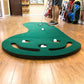 Ground view putting on Intech 3 Hole Portable Golf Putting Mat