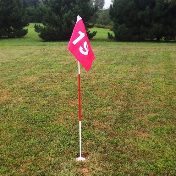 Tour Gear Portable Golf Flag with Cup in someone's yard