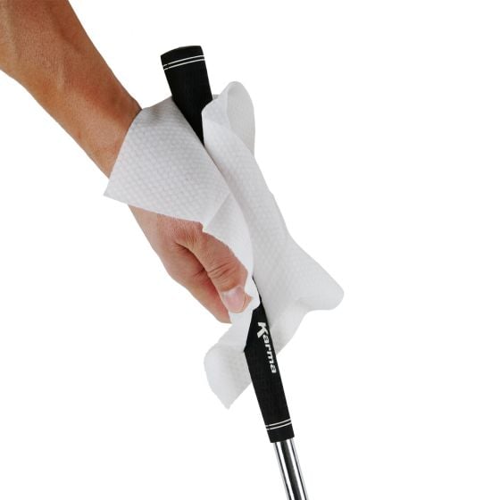 person wiping a grip with a Karma Golf Grip Cleaning Wipe