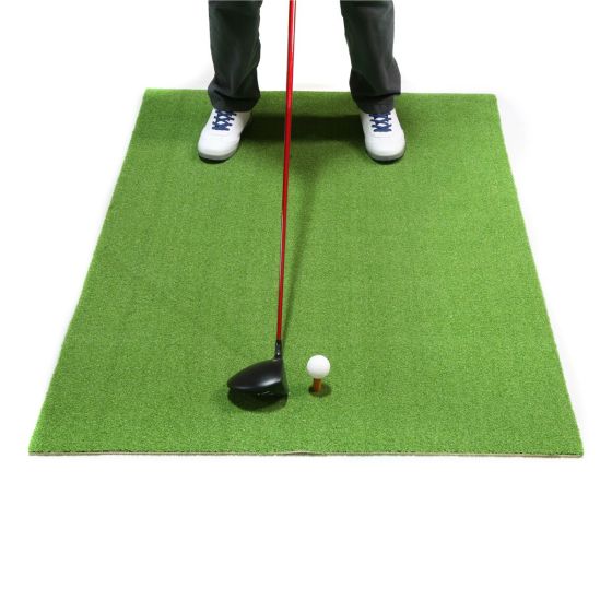 person getting ready to hit a driver on the 3' x 5' Orlimar Residential Golf Mat with a ball on the rubber tee