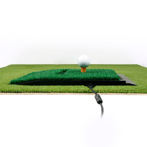 side view of Orlimar Golf Mat for the OptiShot Simulator with OptiShot 2 Simulator and golf ball resting on the rubber tee