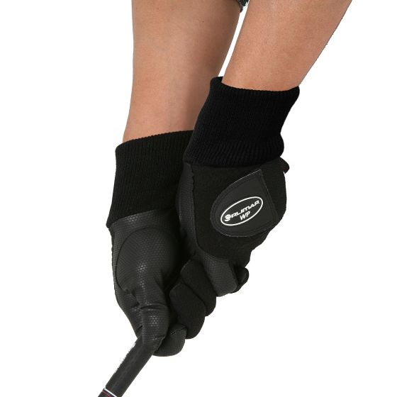 person holding a golf club wearing a pair of Orlimar Winter Performance Golf Gloves