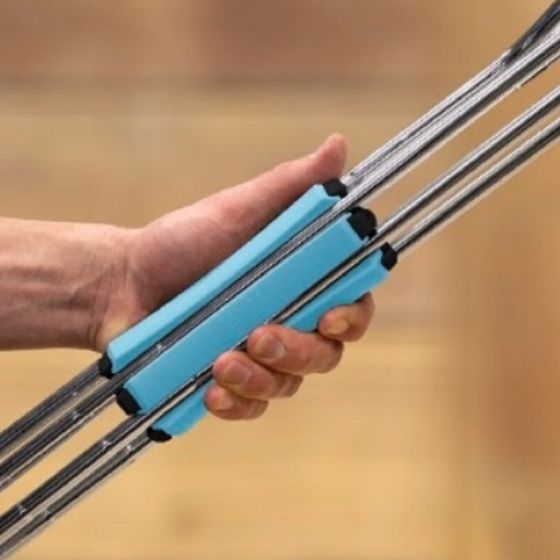 person holding a Gray/Light Blue SILO Golf Club Carrier with golf clubs inside