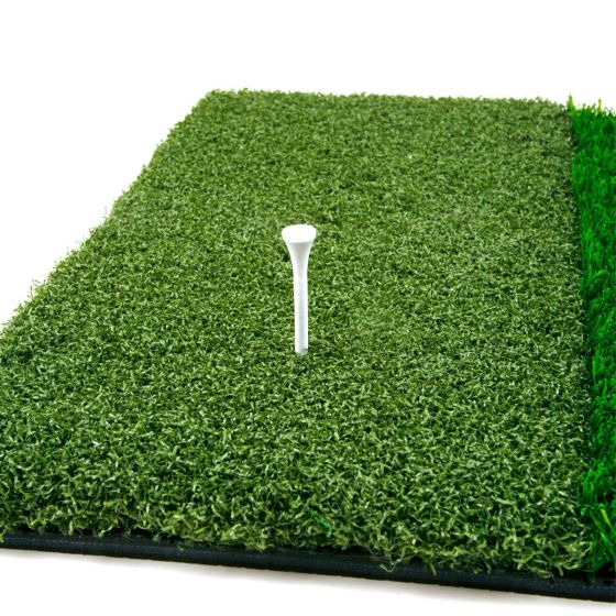 Golf tee placed in tee box area of the Orlimar Triple Surface Golf Hitting Mat