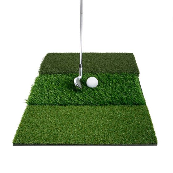 An iron and ball on the simulated rough area of the Orlimar Triple Surface Golf Hitting Mat